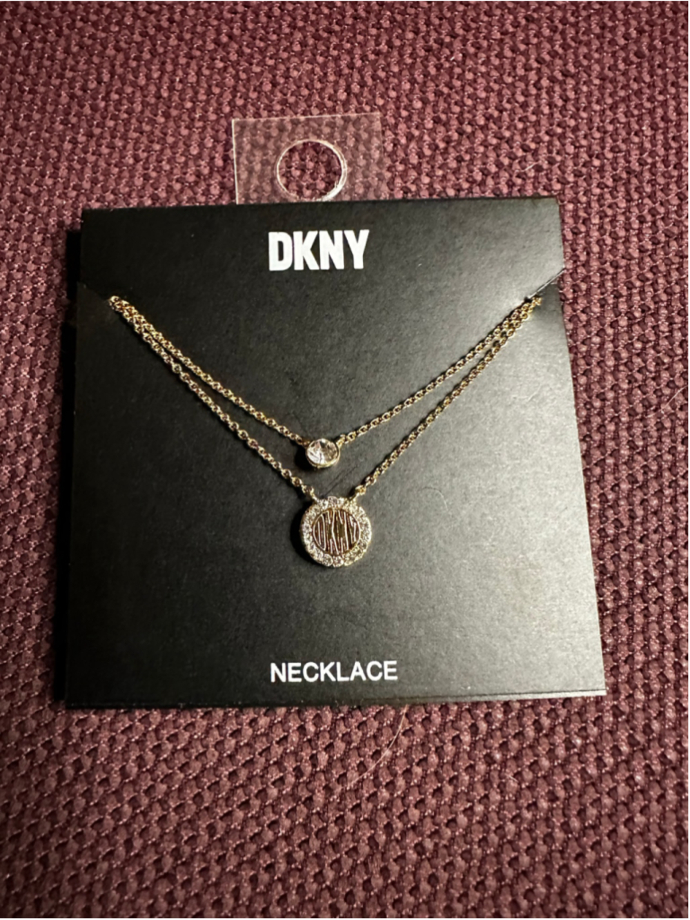 DKNY Gold Tone Crystal Logo Pendant Necklace